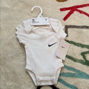 Nike White Baby Bodysuits